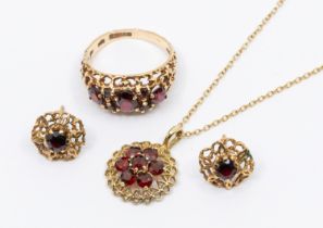 A collection of garnet and 9ct gold jewellery to include a ring set with three graduated oval