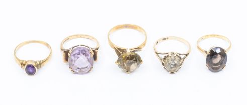 A collection of five stone set 9ct gold dress rings to include a round cut Citrine, size Q, an