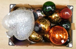A collection of large glass Christmas tree ball decorations in all colours. most in good overall