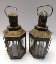 A pair of late 19th Century hexagonal brass oil lanterns with burners. Overall height approx.