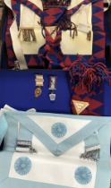 Collection of Masonic regalia in three leather cases.