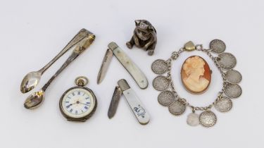 A collection of silver items to include; a novelty Edwardian silver sitting bear figure,