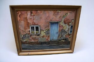 John Godden (British, 1930-1999) -  a framed oil on board of an abandoned house front, signed