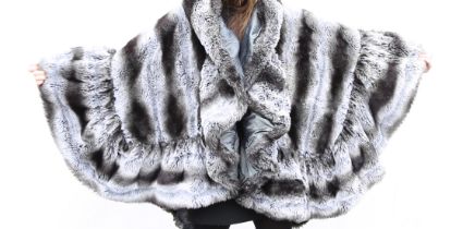 A faux fur cape in grey and white mimicking fox by Angelo Tarlazzi, Paris, cape is fully lined in