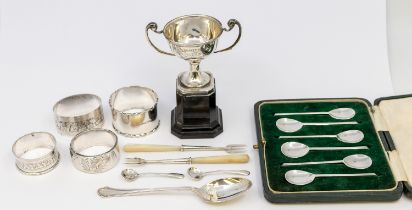 A collection of silver to include; a George V silver small trophy on plastic base, engraved "A.F.