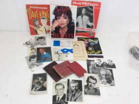 A collection of autographs to include Cary Grant, Dirk Bogarde, William Lucas and more along with