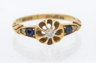 A diamond and 18ct gold ring, comprising a wirework gold daisy claw set to the centre with a diamond