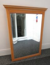 A large contemporary limed beech effect mirror with bevelled glass and traditional cornice. 154cm