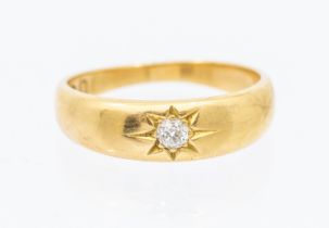 A diamond and 18ct gold gypsy set ring, set with a small old cut diamond approx 0.10ct, width approx
