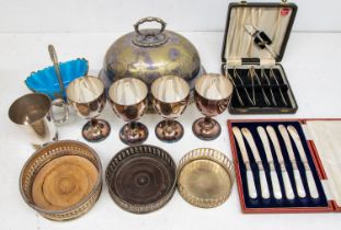 A mixed lot of silver plated table wares including cutlery, goblets, wine coasters, cruets, etc.