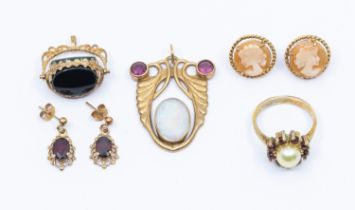 A collection of jewellery including a 9ct gold opal and tourmaline Art Nouveau style pendant, set