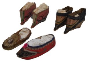 A collection of Chinese child's shoes.