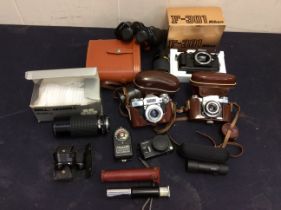 A small collection of cameras and others to include; 2x Zeiss Ikon Contaflex in case, a Nikon in