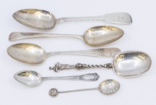 A small collection of mixed silver spoons to include; an Irish silver fiddle pattern table spoon