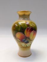 A Royal Worcester vase decorated with hand painted fruit to a mossy surround by Ricketts, gilt