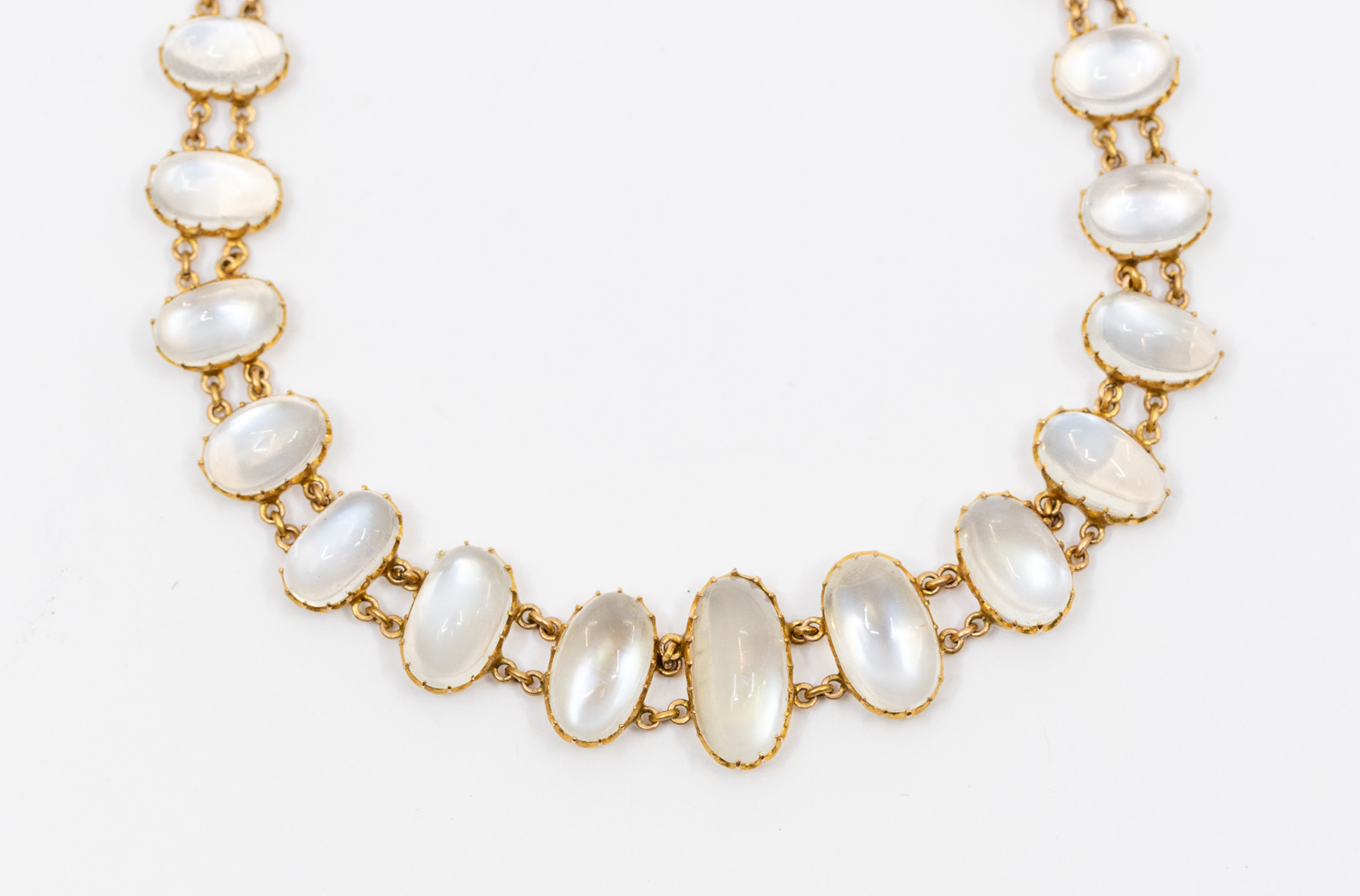 A vintage moonstone and gold choker necklace, comprising a row of graduated oval moonstones to the - Image 2 of 3