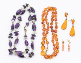 An amber pebble bead necklace, length approx 24', along with a pair of amber drop earrings, together