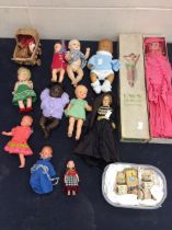 A collection of small and miniature dolls to include dolls from the late 1940s to the 1970s. A