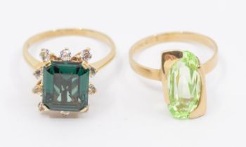 Two 9ct gold stone set dress rings, including an elongated pale green stone set ring, size S,