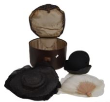 A box of accessories to include a top hat by Woodrow of London, 1920s/30s, made of silk and