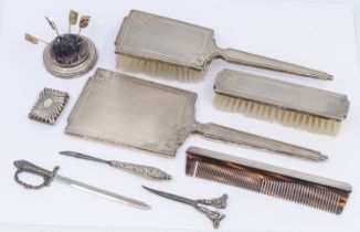 A collection of silver to include; a matched Queen Elizabeth II silver part dressing table set