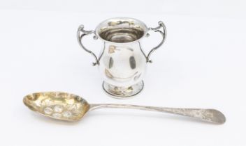 A George III silver berry spoon, gilt bowl and floral engraved terminal, hallmarked London, 1791,