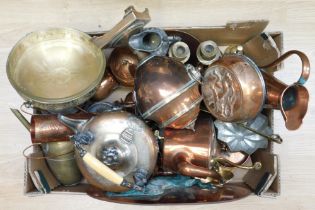 A collection of late 19th and early 20th Century brass and copper wares to include kettles, vases,