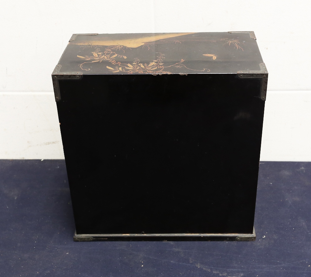 An early 20th Century Chinese black lacquered small table top cabinet, Chinese round wall hanging, - Bild 5 aus 6