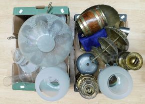 A collection of brass oil lamps, early 20th Century ceiling lamp, shades and copper wares.