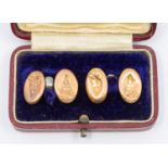 A pair of cufflinks, foliate decoration, dented, weight approx 3.6gms, in a case