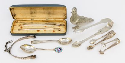 A collection of silver items to include; a pair of late Victorian silver boot spurs, linked chain to