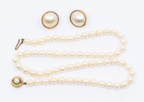 A pair of 9ct gold Mabe pearl earrings, diameter approx 15mm, on clip fittings, along with a