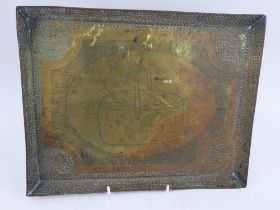 A 19th century prisoner of war hand made brass tray with central flower basket decoration. Signed