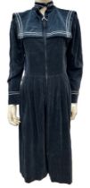 A black velvet 1980s Laura Ashley day dress in a sailor design, the sailor collar has a satin tie at