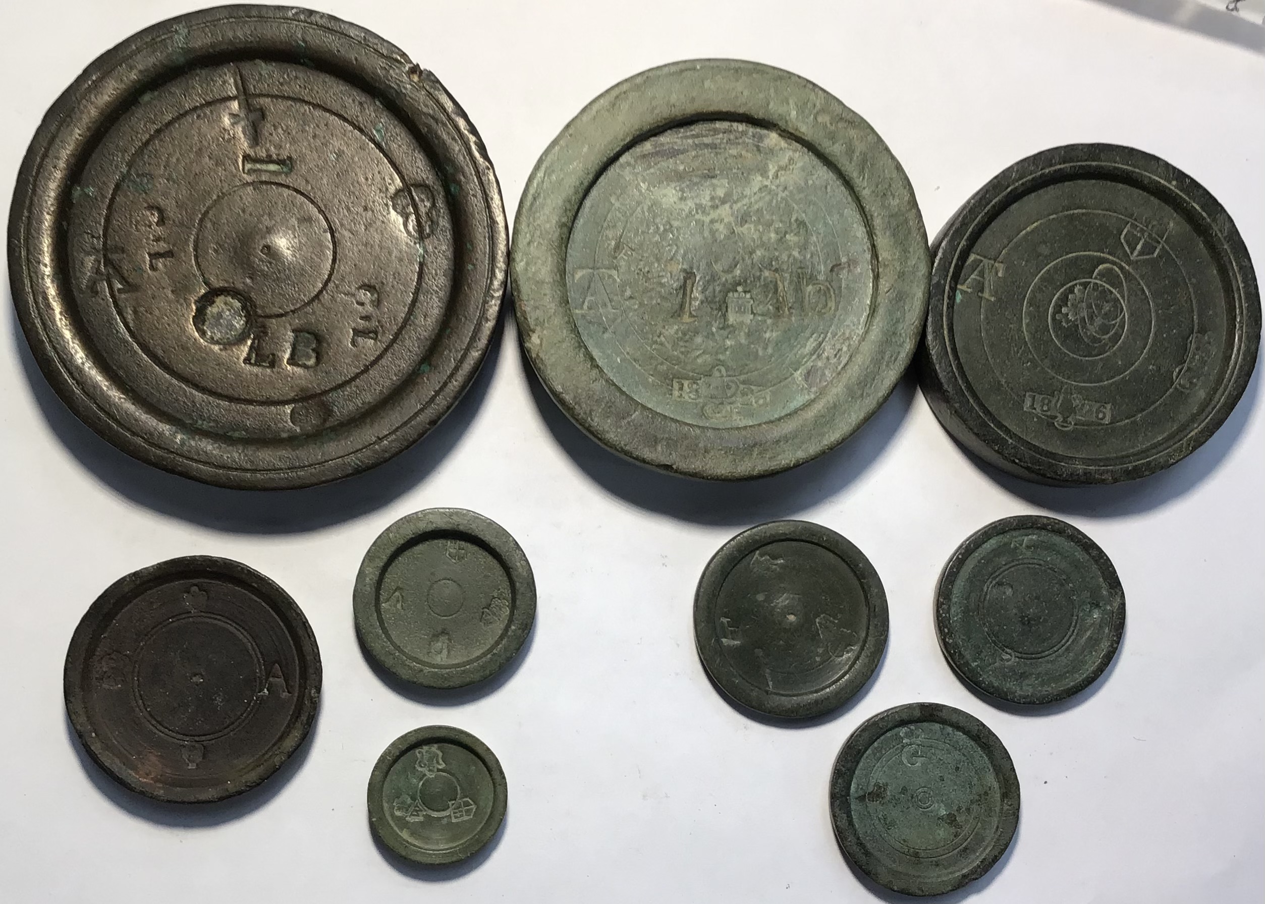 Collection of Trade weights. ½lb avoirdupois bronze trade weight dated 1826 (George IV). Stamped