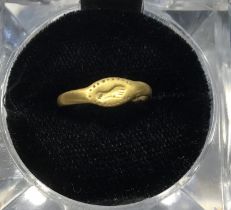 Late Medieval Gold finger ring of a small size (possibly for a child) engraved escutcheon of a