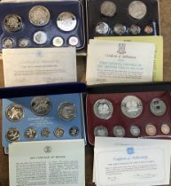 Silver and part silver Proof Year Sets fromBelize 1975 full Sterling Silver Set, Papua New Guinea