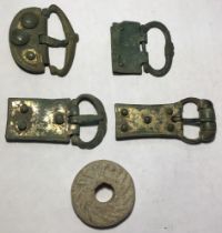 Four Medieval gilded bronze buckle strap ends circa.1200-1500. Three have pins, With a 15th to