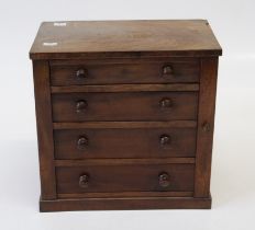 A mid Victorian figured mahogany table top specimen or jewellery box, the oblong top over four