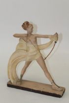 An early 20th century Art Deco plaster figure of Diana, on rectangular plinth ( Bow at fault)