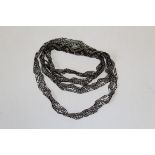 An early 20th century steel beaded lace ribbon necklace. Featuring a zig zag pattern. Approximate