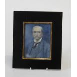 Edwardian English School, bust length portrait miniature of bespectacled gentleman wearing a blue