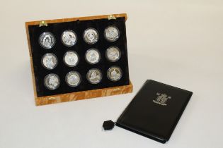A cased set of twelve Royal Mint silver English monarch Royal Heritage coins