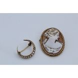 A seed pearl crescent brooch along with a 9ct gold shell cameo brooch. The crescent is stamped "