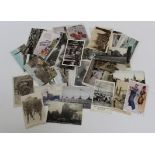 A small collection of approximately eighty early 20th century and later postcards. Including the