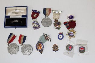A collection of enamelled Masonic stewards medals, a Navy sweetheart brooch and other enamelled