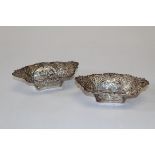 A pair of Edward VII boat shaped, pierced and embossed sweetmeat dishes, marked for Walker and Hall,