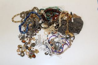 A collection of silver, hardstone and costume jewellery to include a Swedish silver pendant