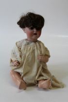A J D Kestner bisque head doll of large size. Head mould number 257. Sleeping eyes and open mouth,