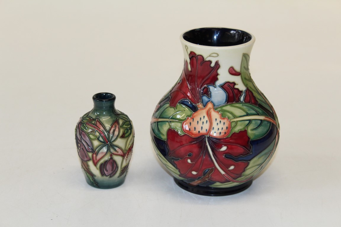 Two late 1990's Moorcroft vases, the larger of baluster form decorated in the Simeon pattern,